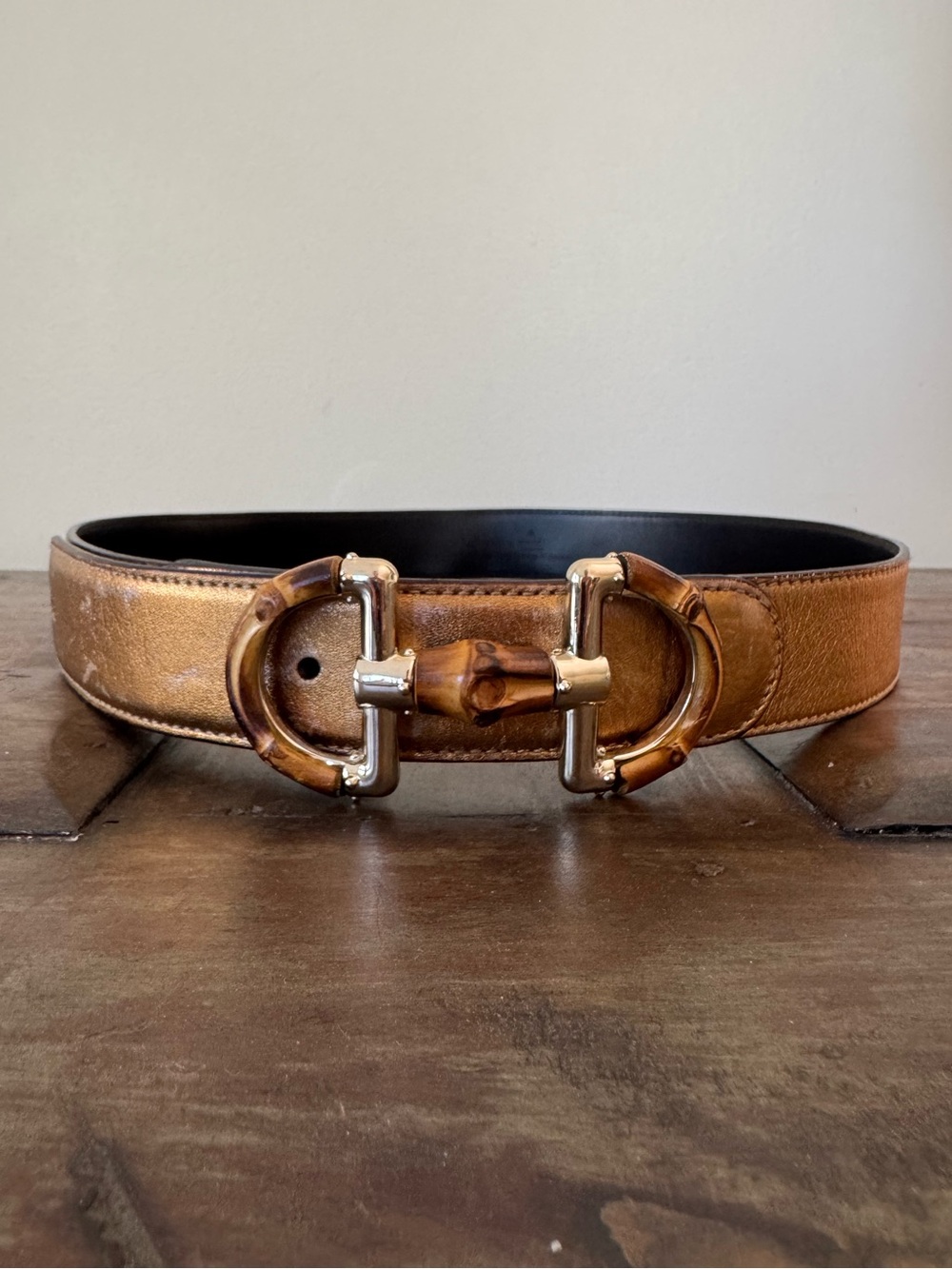 Vintage Gucci metallic gold black leather women belt with bamboo horsebit buckle